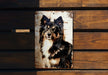 a picture of a dog with a bow on it's head