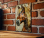 a picture of a horse on a brick wall