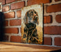 a picture of a dog on a brick wall