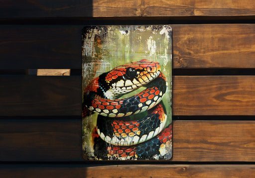 a painting of a snake on a wooden bench