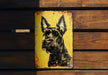 a picture of a black dog on a yellow background