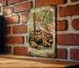 a picture of a cat on a brick wall
