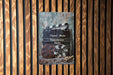 a movie poster hanging on a wooden wall