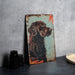 a painting of a dog on a wall next to a plate