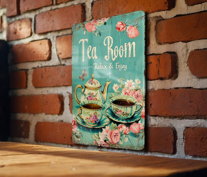 a tea room sign on a brick wall