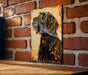 a picture of a dog on a brick wall