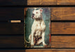 a picture of a dog sitting on a wooden bench