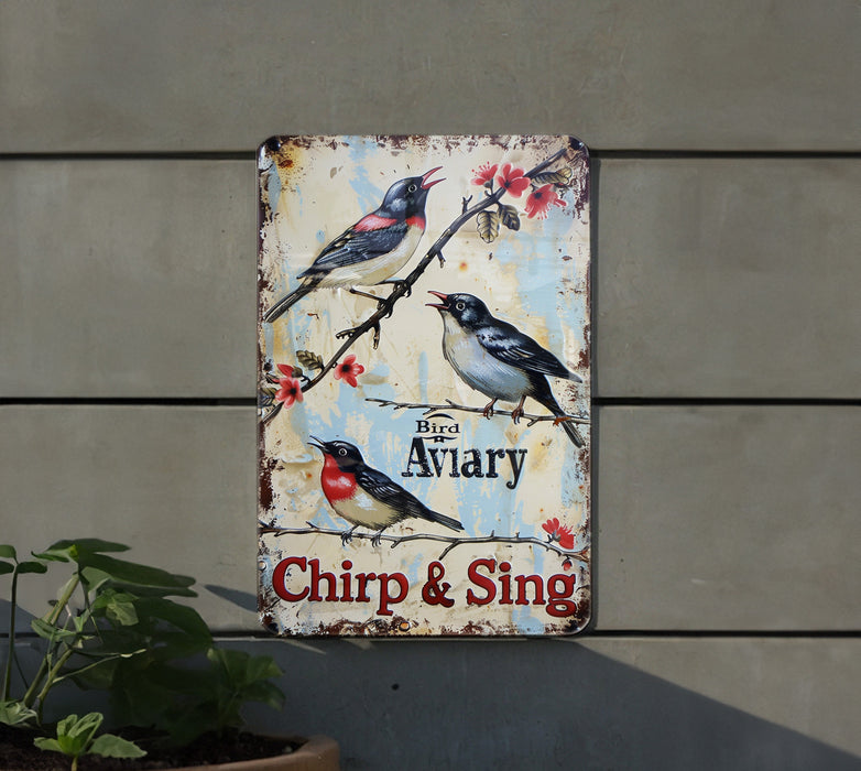 a sign on the side of a building with birds on it