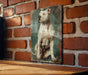 a picture of a dog on a brick wall