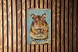 a picture of a hamster on a wooden wall