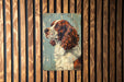 a painting of a dog on a wooden wall