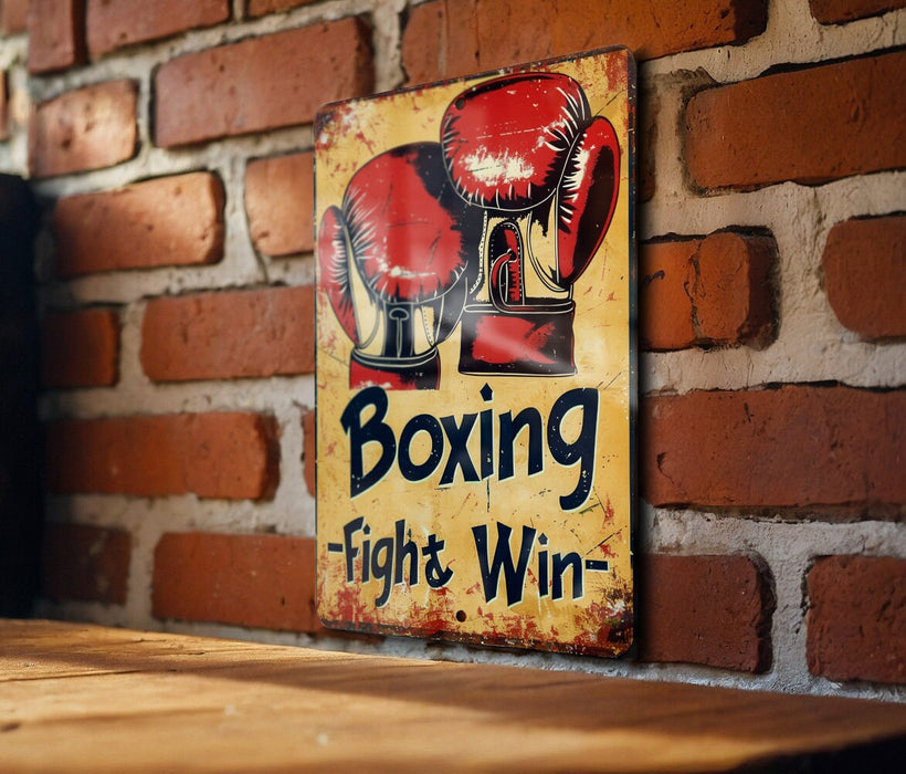 a sign on a brick wall that says boxing fight and win