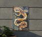 a painting of a snake on the side of a building