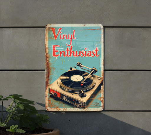 a sign with a record player on it