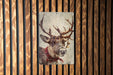 a picture of a deer on a wooden wall