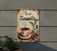 a sign that says tea and tranquility with a cup of coffee