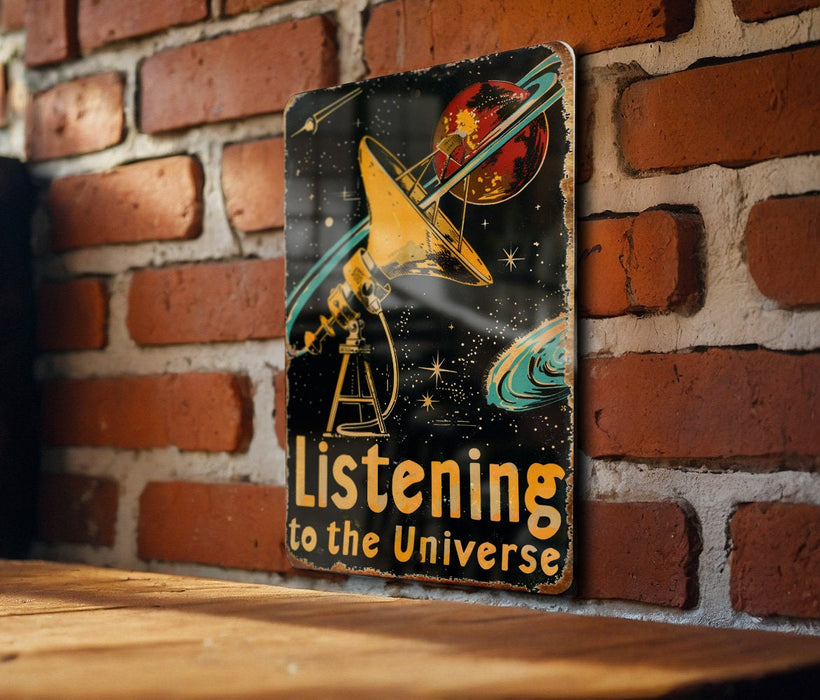 a sign on a brick wall that says listening to the universe