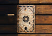 a wooden wall with a metal plate on it