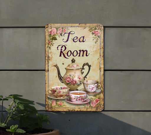 a sign that says tea room on it