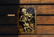 a picture of a skeleton playing a violin