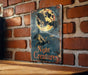 a sign on a brick wall that says night creatures