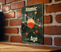 a sign on a brick wall that says atomic