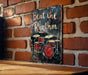 a sign on a brick wall that says beat the rhythm