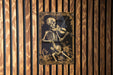 a picture of a skeleton playing a violin
