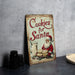 a sign that says cookies for santa next to a plate of cookies