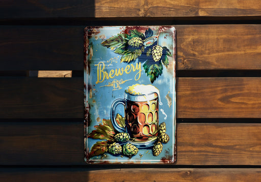 a metal sign with a mug of beer on it