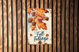 a sign on a wooden wall that says fall foliage