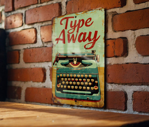 a sign that says type away on a brick wall