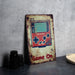 a game on sign sitting on a table