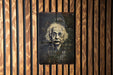 a portrait of albertian albert on a wooden wall