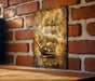 a picture of a ship on a brick wall