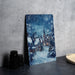 a picture of a snowy village on a table