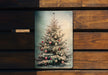 a picture of a christmas tree on a plaque