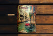 a book sitting on top of a wooden bench