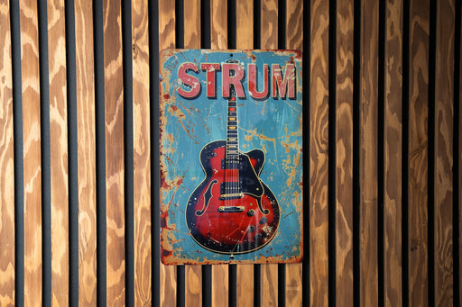 a red and blue guitar on a wooden wall