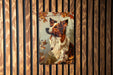 a painting of a dog on a wooden wall