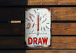 a close up of a sign on a wooden wall