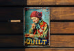 a metal sign with a picture of a clown on it