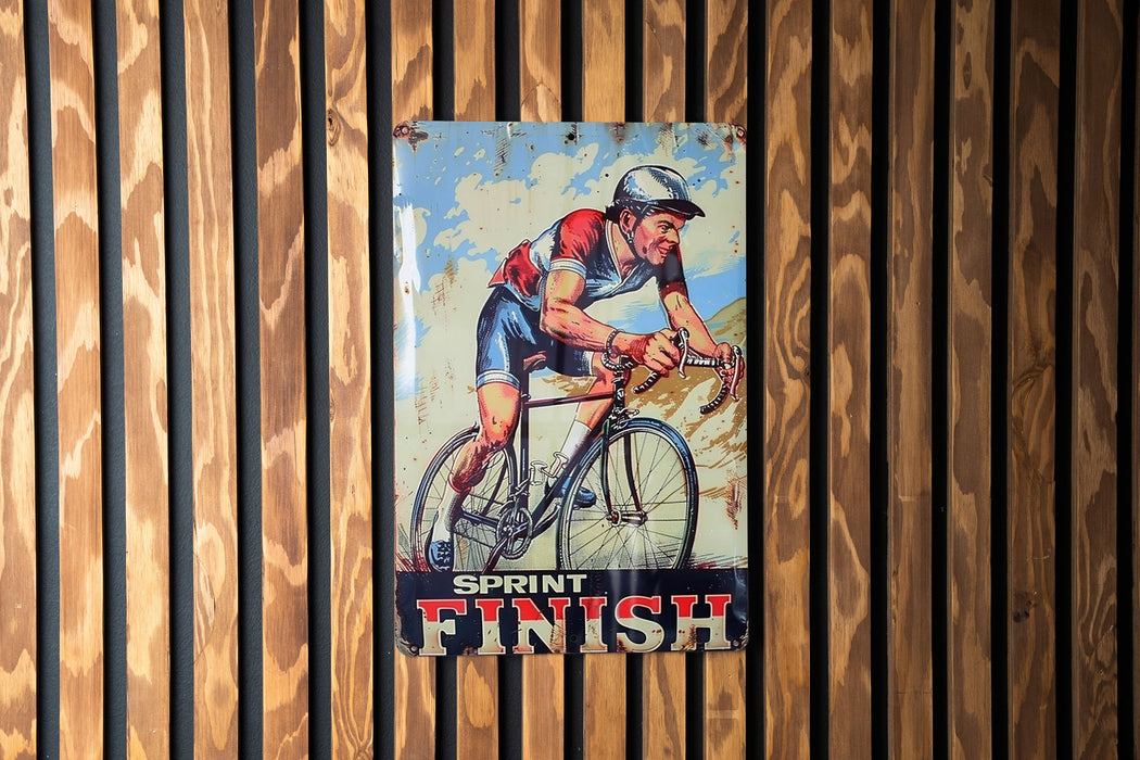 a picture of a man riding a bike on a wooden wall