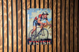 a picture of a man riding a bike on a wooden wall