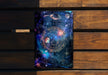 a phone case sitting on top of a wooden bench