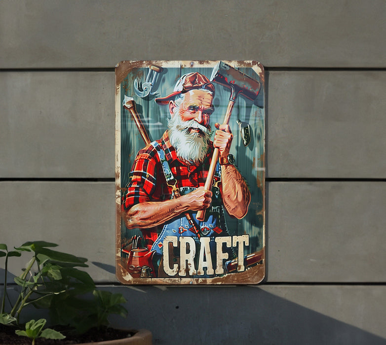 a metal sign with a picture of a man holding a hammer and a wrench