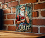 a picture of a man with a beard holding a hammer