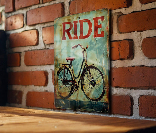a picture of a bicycle on a sign on a brick wall