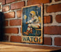 a picture of a man sitting on a chair on a brick wall
