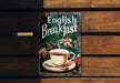 a book on english breakfast with a cup of coffee
